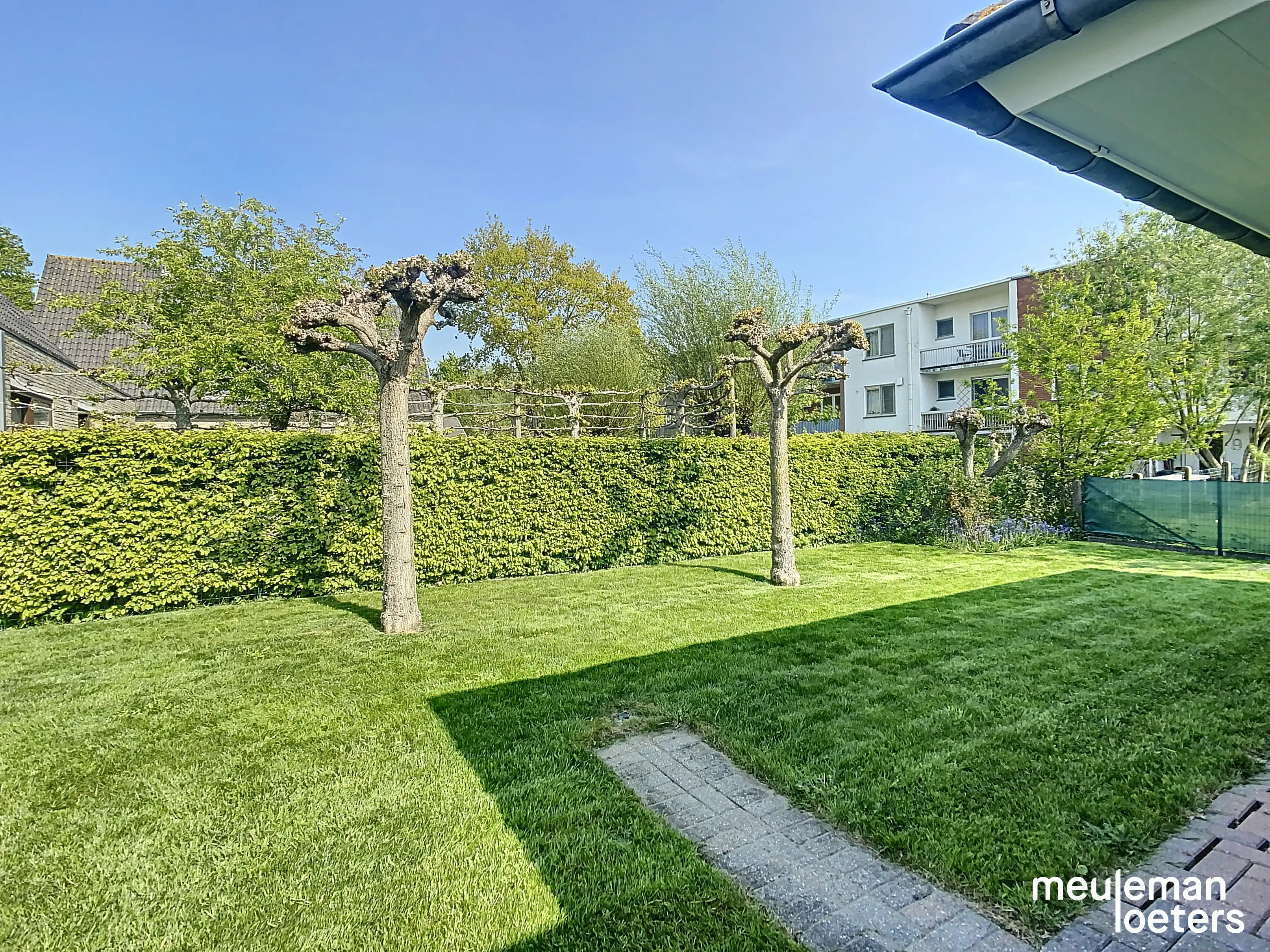Schitterend gelegen en energiezuinige gelijkvloerse woning met tuin en garage foto 15