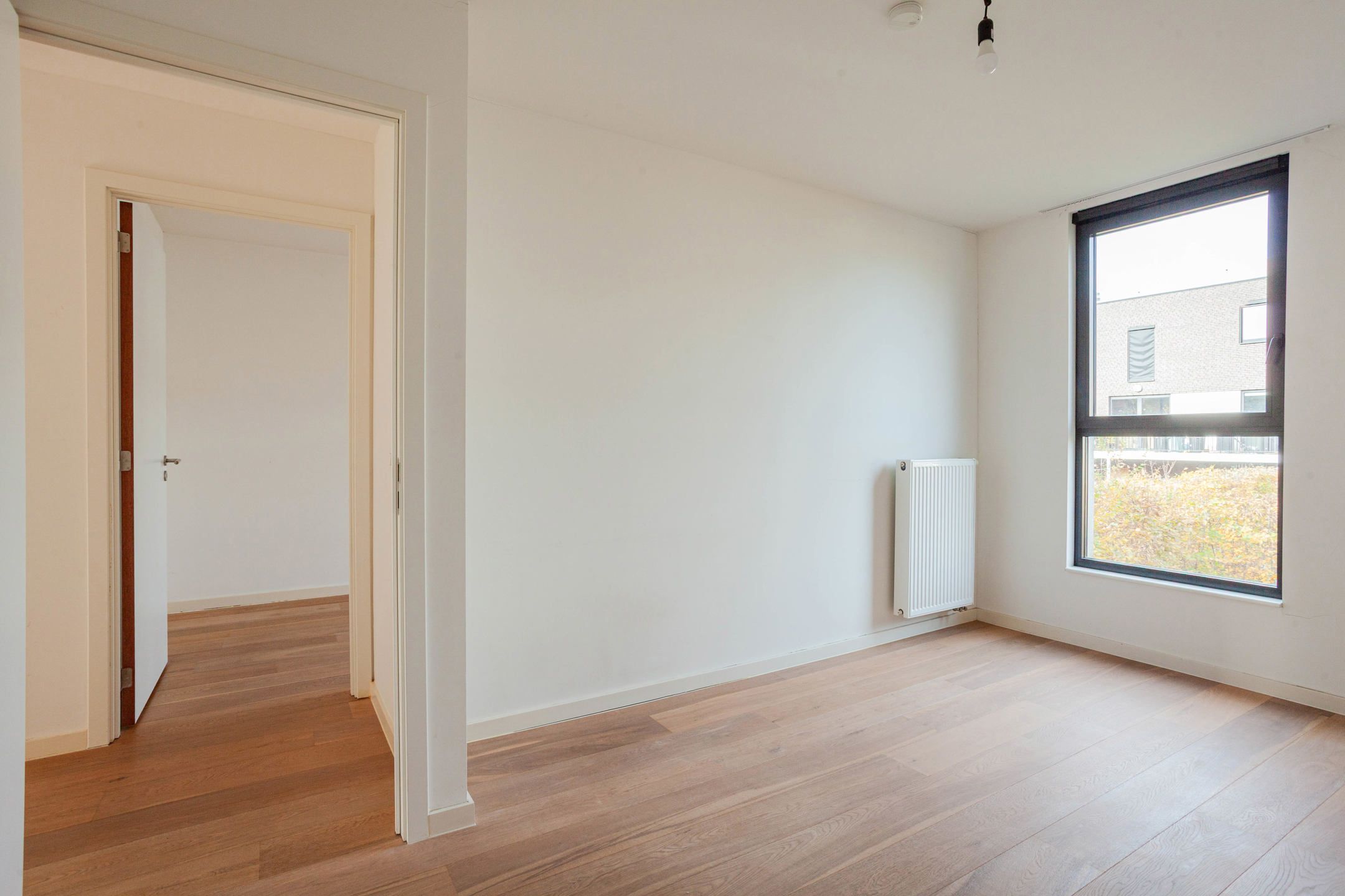 Recente woning met tuin, zonnig dakterras en staanplaats foto 12