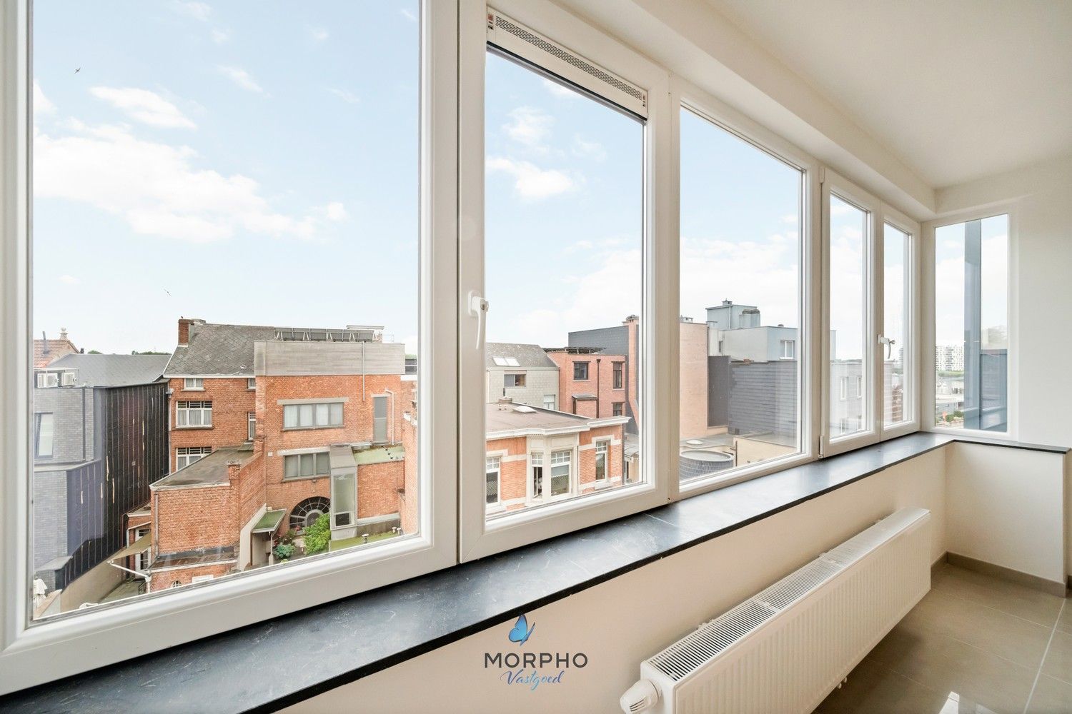 Modern en energiezuinig 2-slaapkamerappartement op de derde verdieping in hartje Temse! foto 6