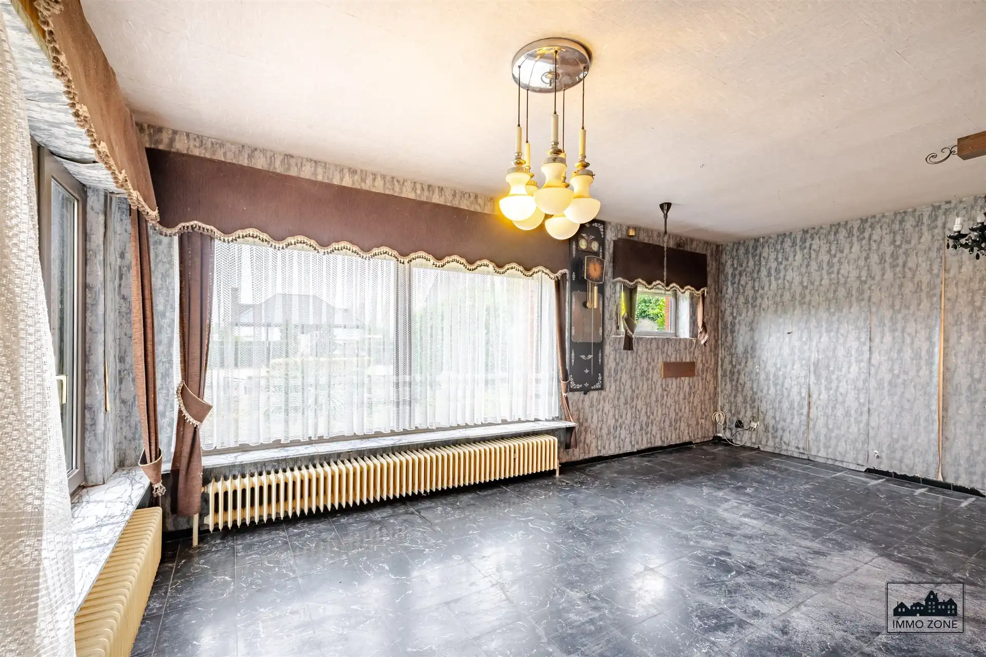 Te renoveren woning op ruim perceel met groene zone foto 5