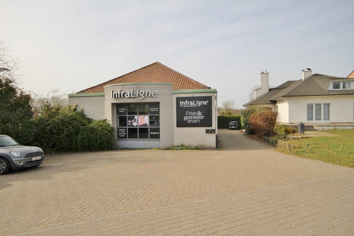 Instapklaar handelspand met magazijn op toplocatie in Sint-Truiden foto 25