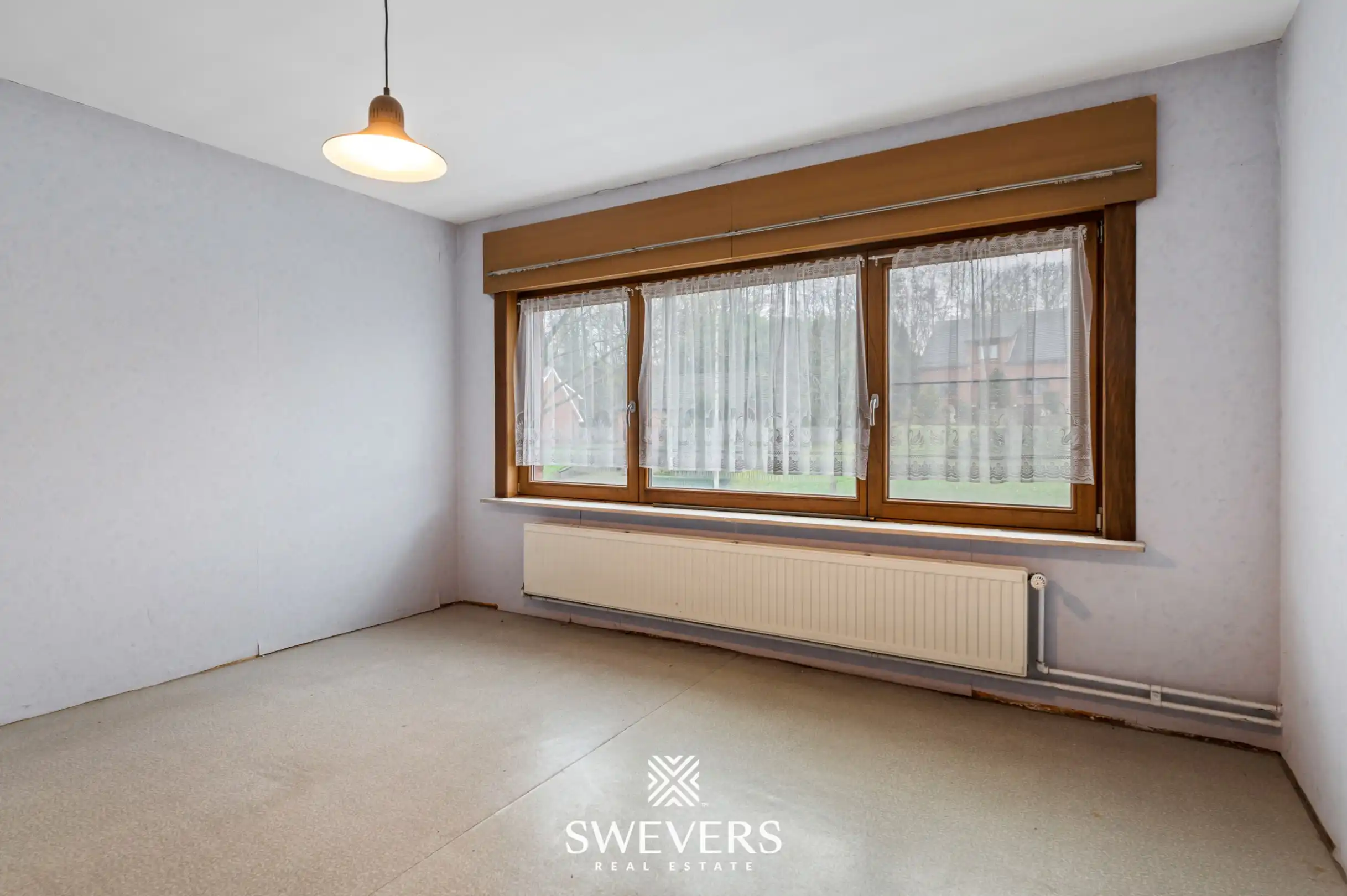 Te renoveren halfopen woning met ruim perceel in Diest foto 14
