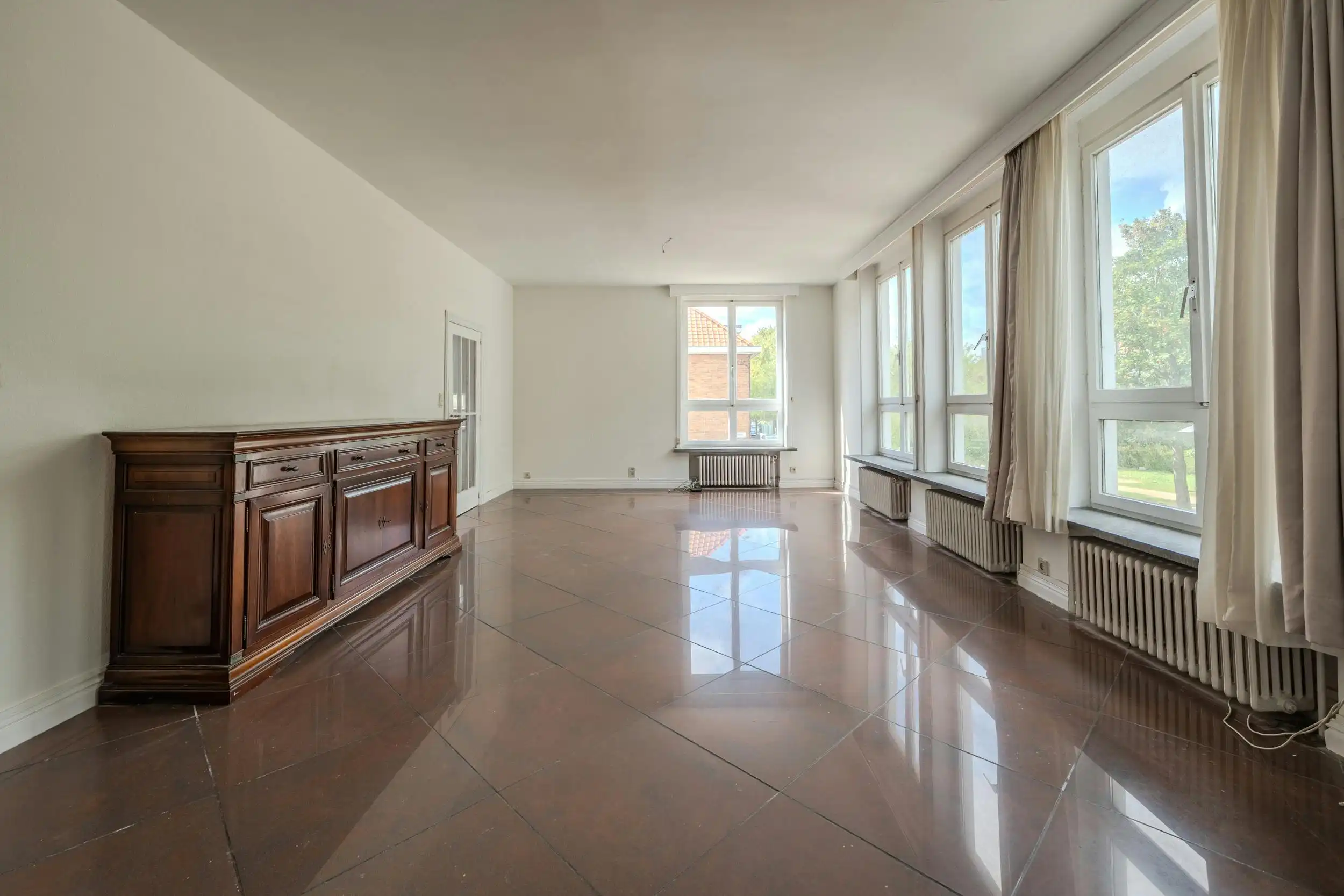 Hoekhuis met veel potentieel te koop te Mariakerke foto 2