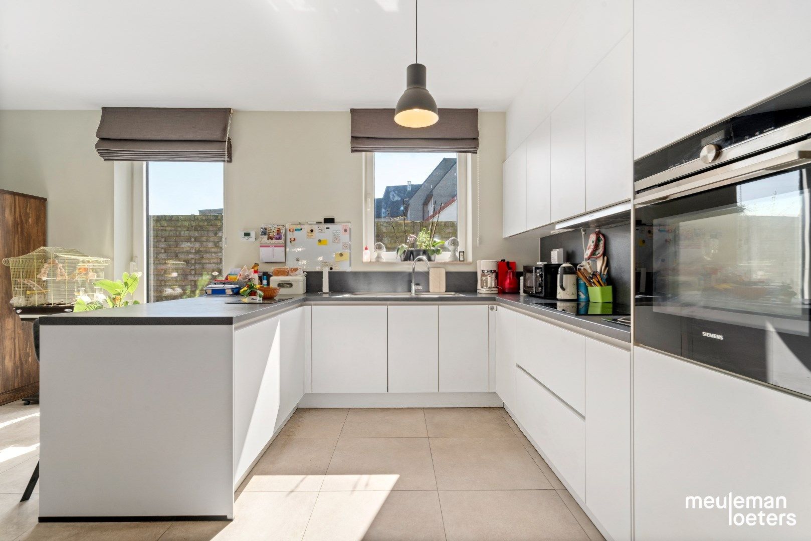 Schitterend gelijkvloers appartement met terras foto 4