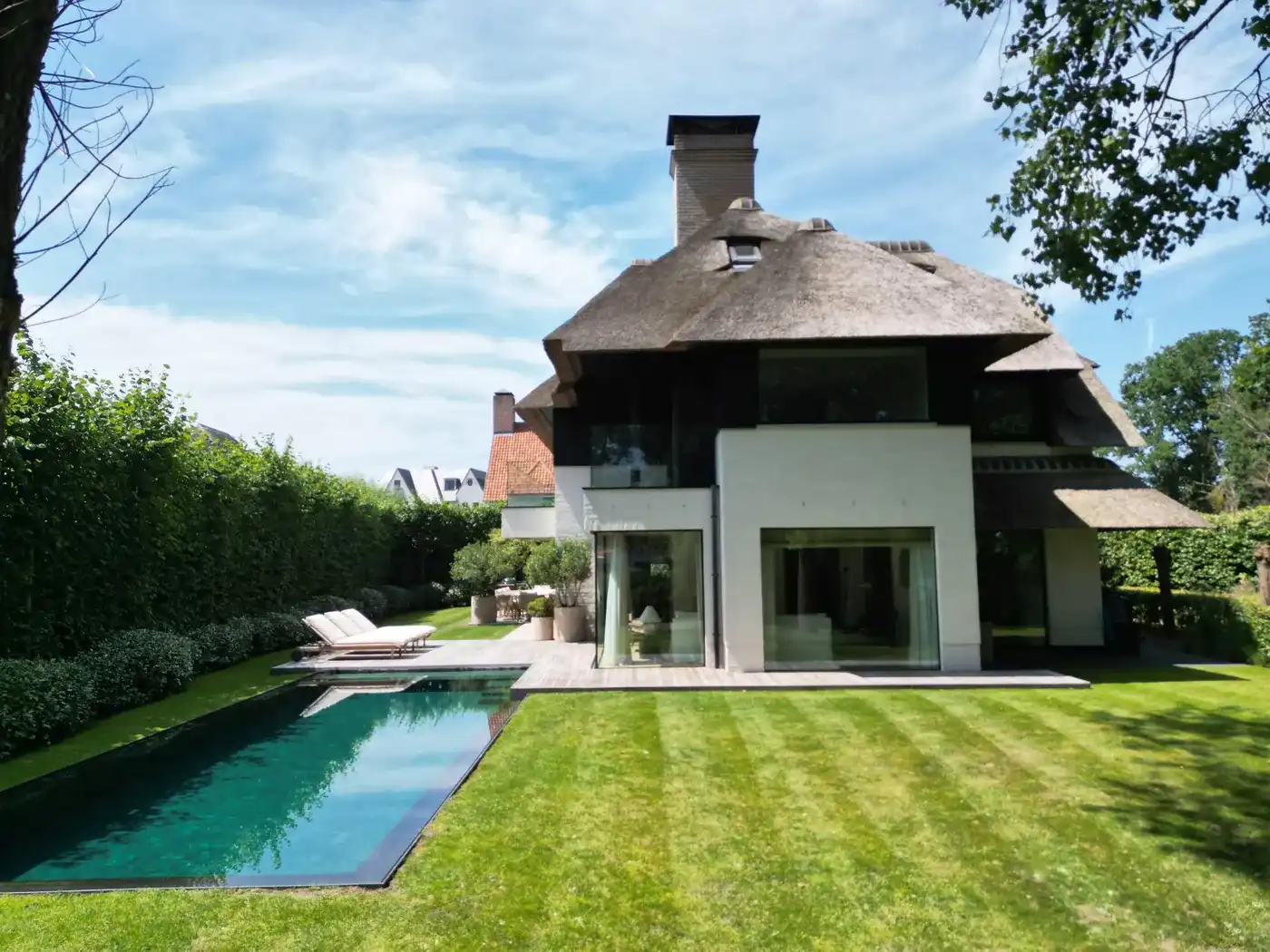Recent gebouwde villa voorzien van een luxe afwerking, grenzend in alle privacy aan het Zwin nabij de Oosthoek  foto 24