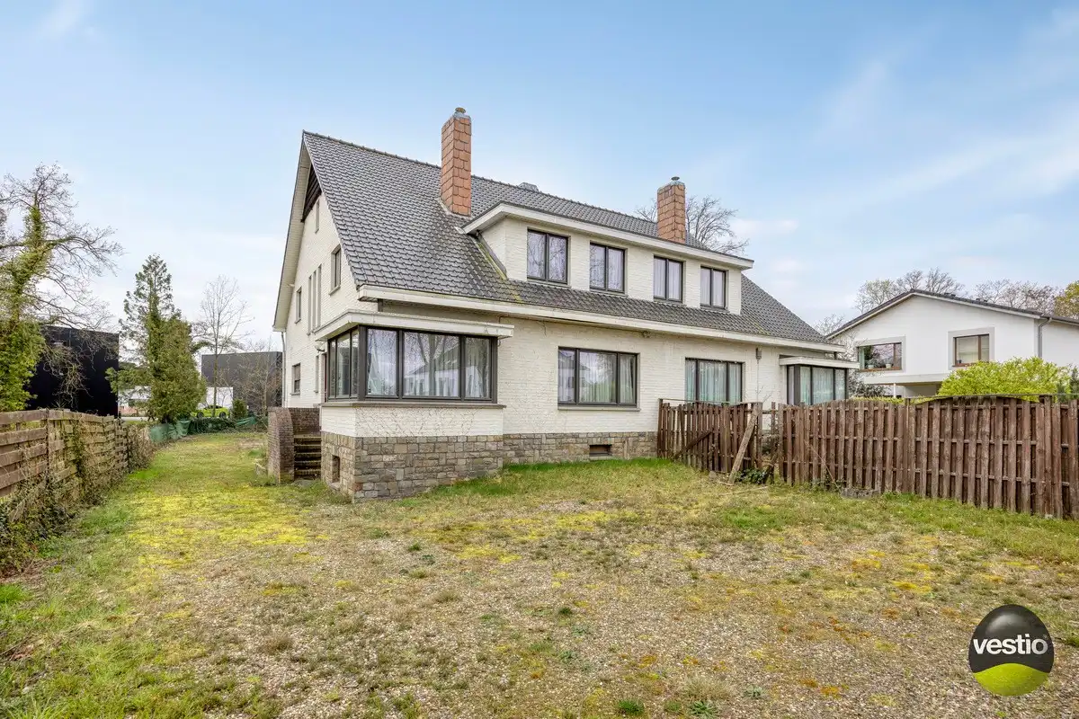 Ruime te renoveren woning met 3 slaapkamers op vlot bereikbare ligging (Genkersteenweg). foto 2