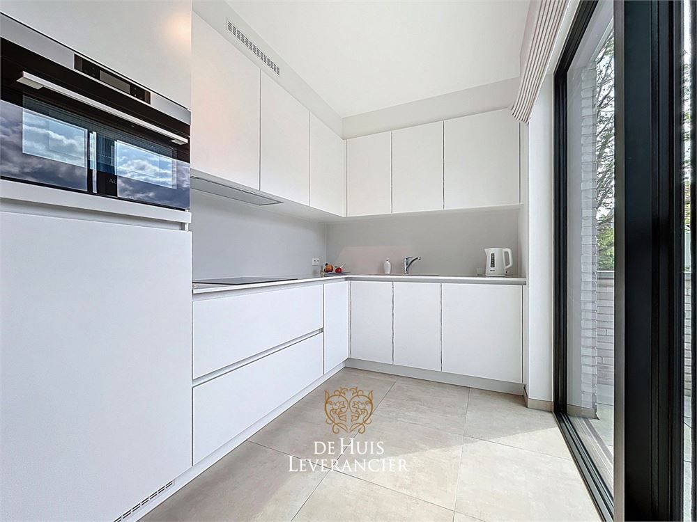 Discrete luxe & tijdloze elegantie : subliem nieuwbouwappartement met terras en gemeenschappelijk tuin te koop in Boechout foto 7