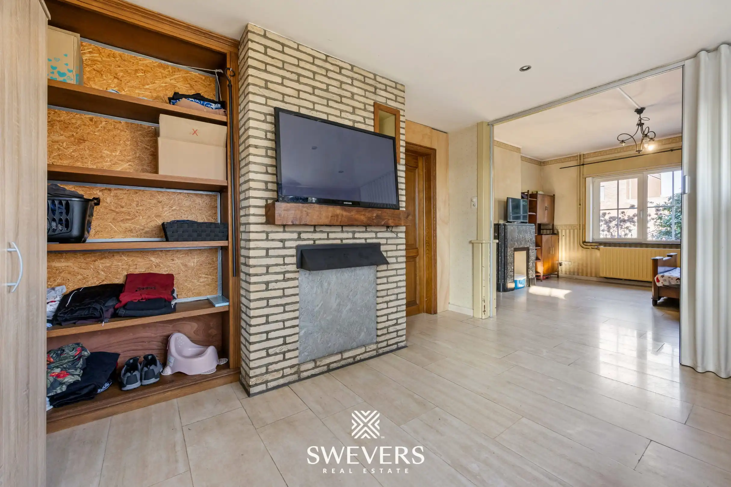 Te renoveren open bebouwing met ruime volumes en zuidgericht perceel in Heusden   foto 5