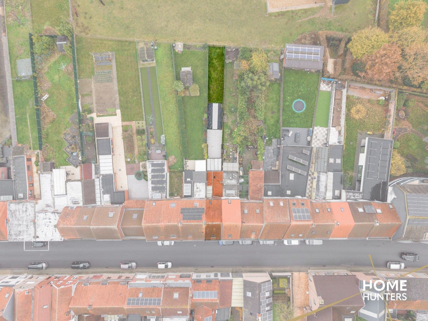 Charmante te renoveren rijwoning met 3 slaapkamers en diepe tuin op centrale ligging in Menen foto 2