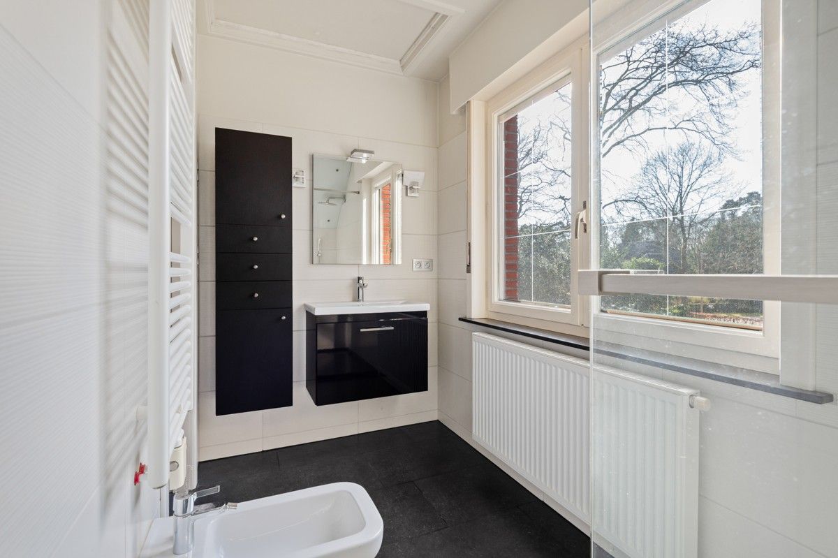 Charmant te renoveren woning op 2192m² aan de voet van het Zoerselbos. foto 16