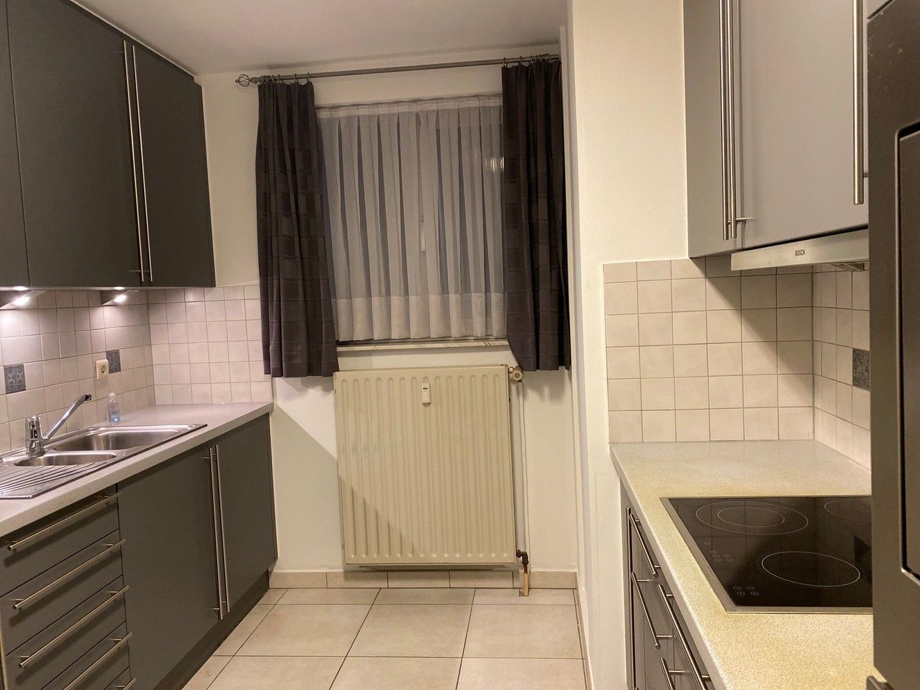 Gelijkvloers appartement met 2 slaapkamers, kelder en gesloten garage foto 3