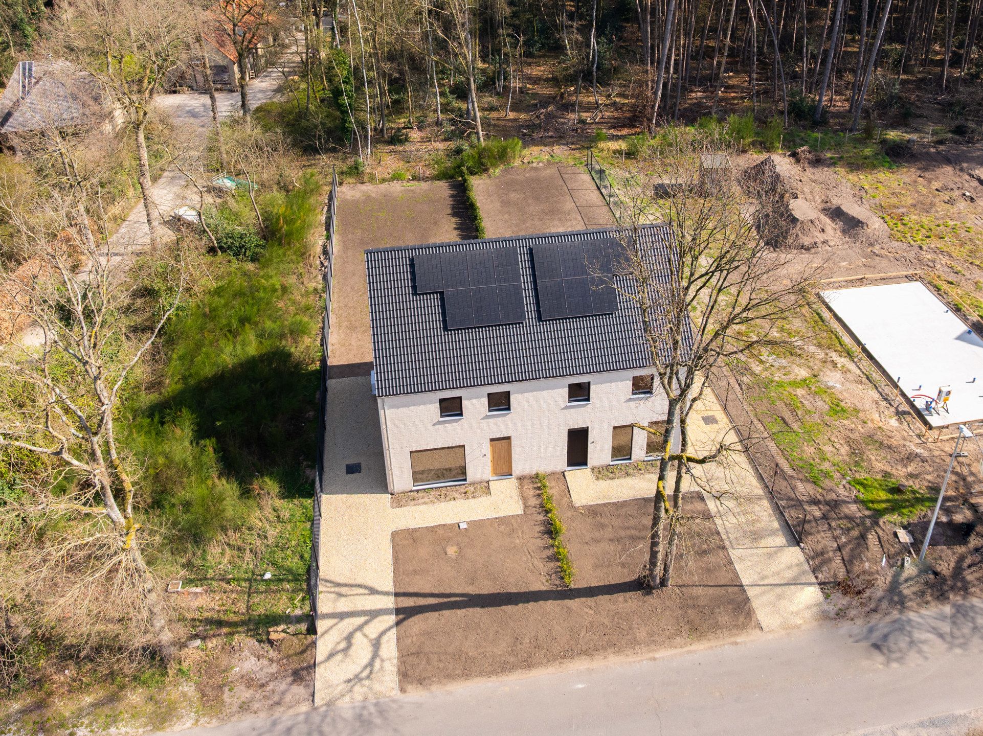 Stijlvolle nieuwbouwkoppelwoning met adembenemend boszicht foto 33
