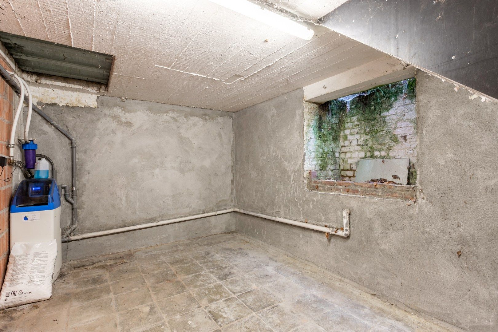 Ruim gelijkvloersapp te koop centrum Halle met 1 à 2 slpk, garage en tuin foto 17