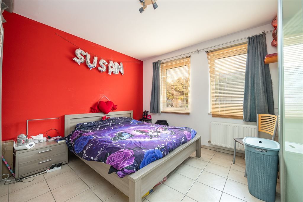 Gelijkvloers appartement met privatieve tuin! foto 9