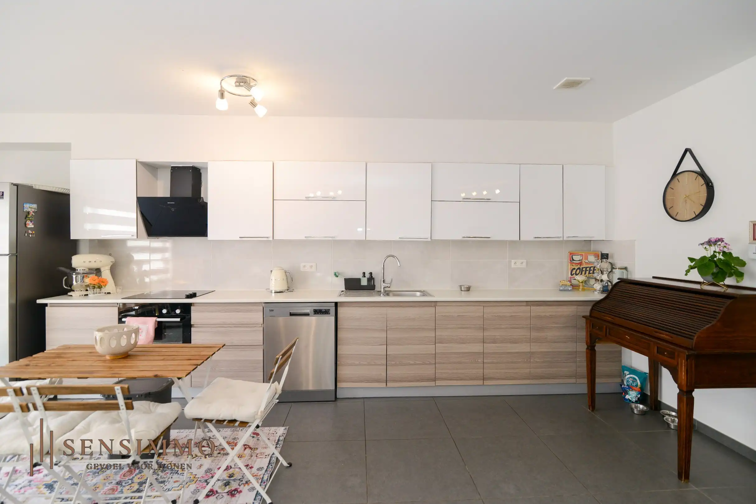 Gelijkvloers tweeslaapkamer appartement van 110m² met tuin, parking en kelderberging foto 8