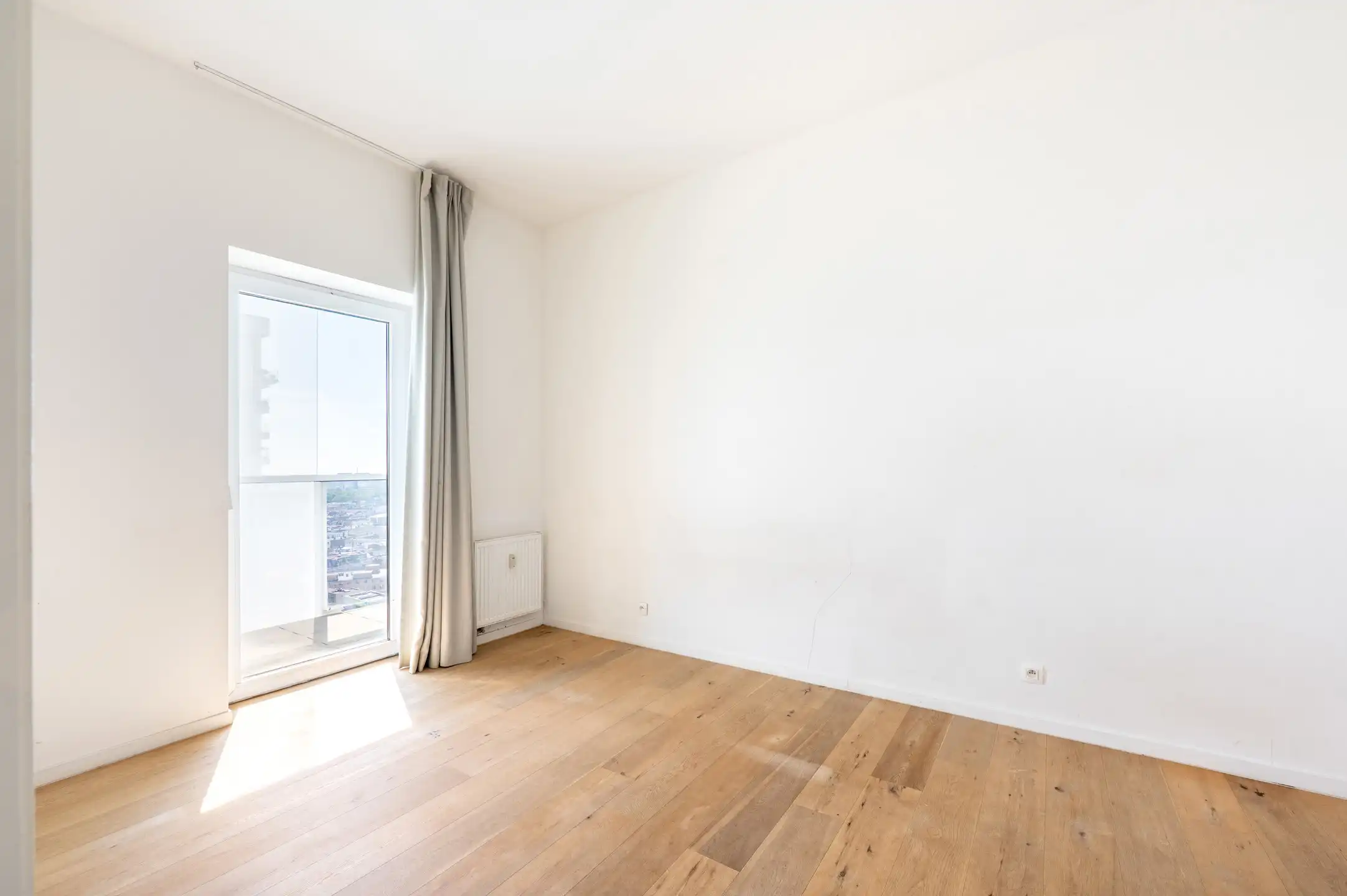 Lichtrijk appartement met terras en EPC A foto 12