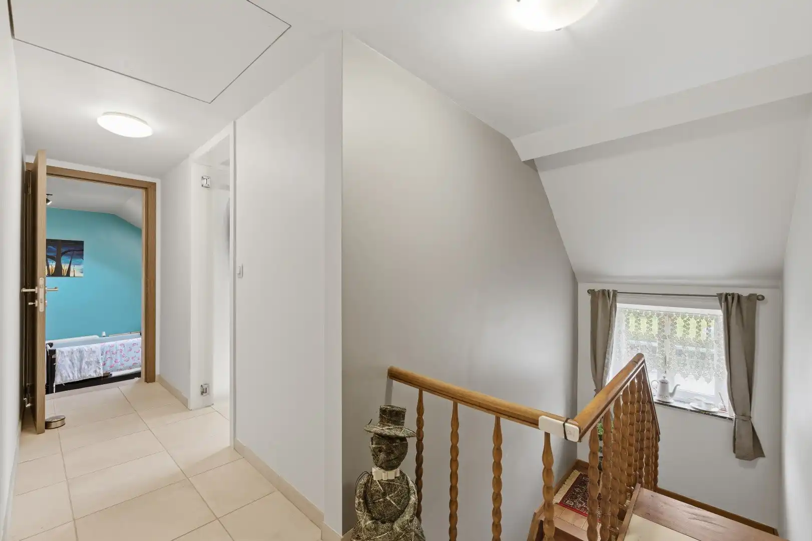 Zeer goed gelegen open bebouwing met 2 zeer ruime slaapkamers, garage en aangelegde tuin met terras foto 13