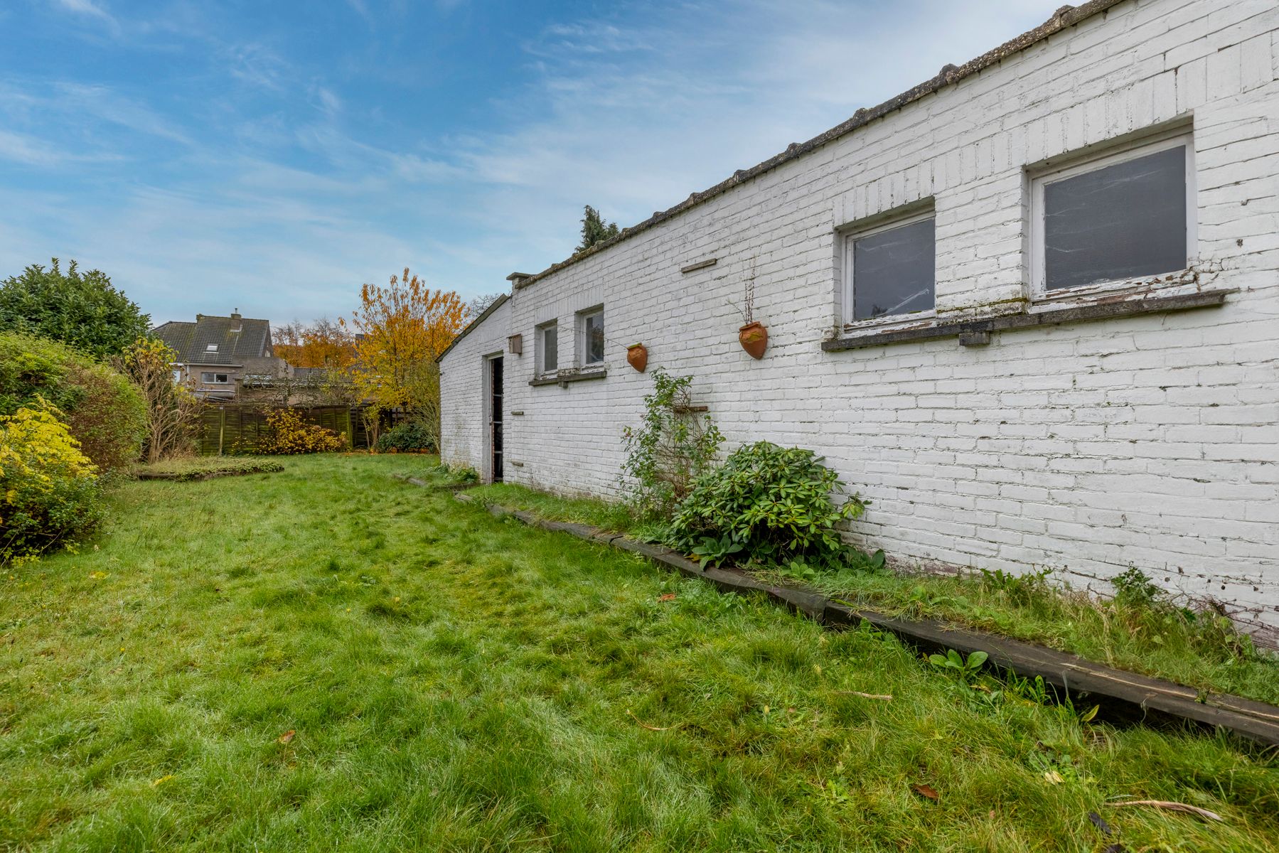 Halfopen woning met 4 slaapkamers, tuin en garage foto 24