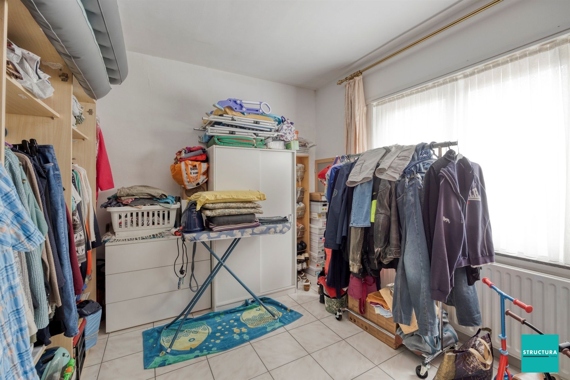 Opbrengsteigendom met 2 appartementen en 7 garageboxen foto 10