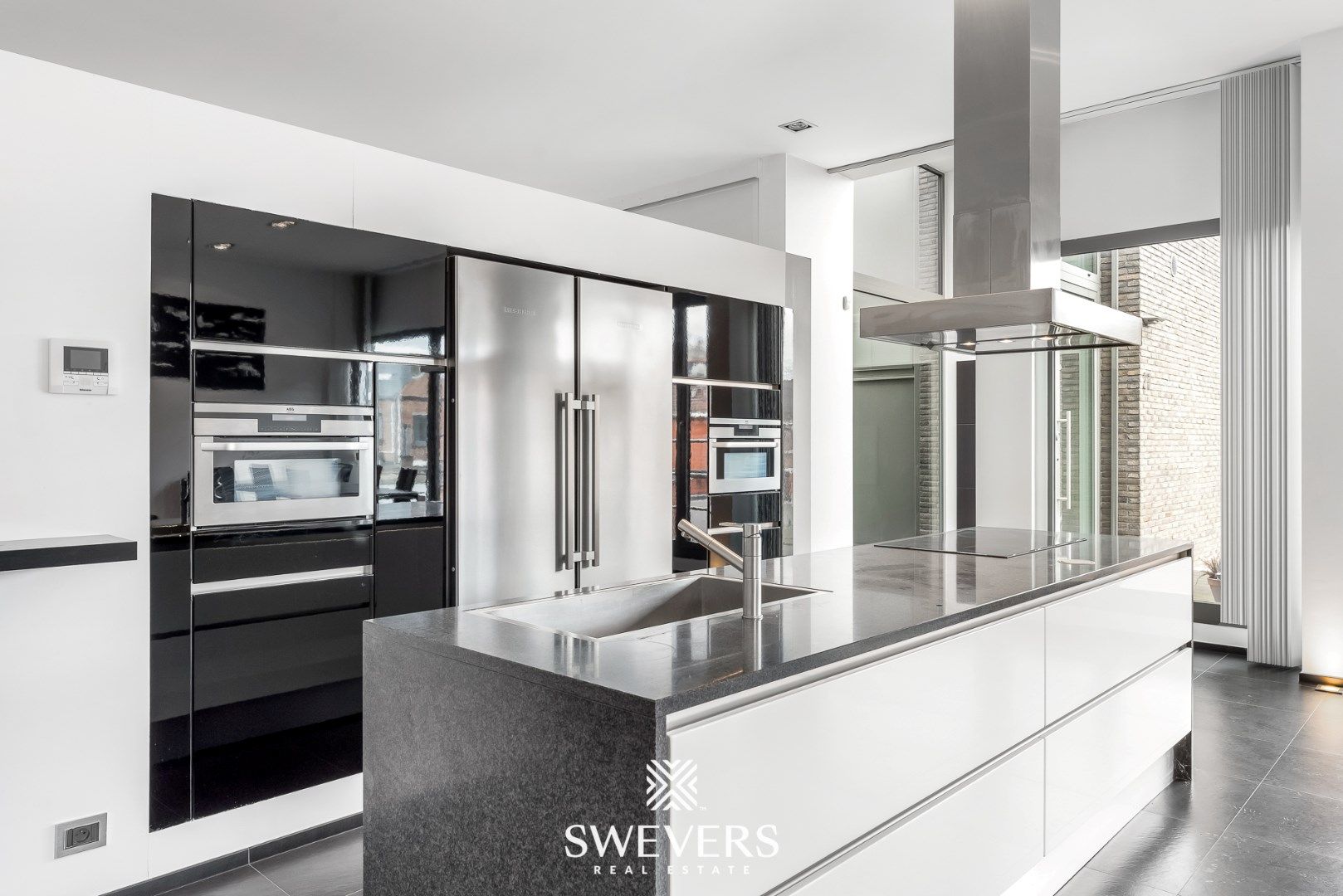 Ruime luxueuze loft met groot dakterras nabij Hasselt centrum ( 164 m2 ) foto 7