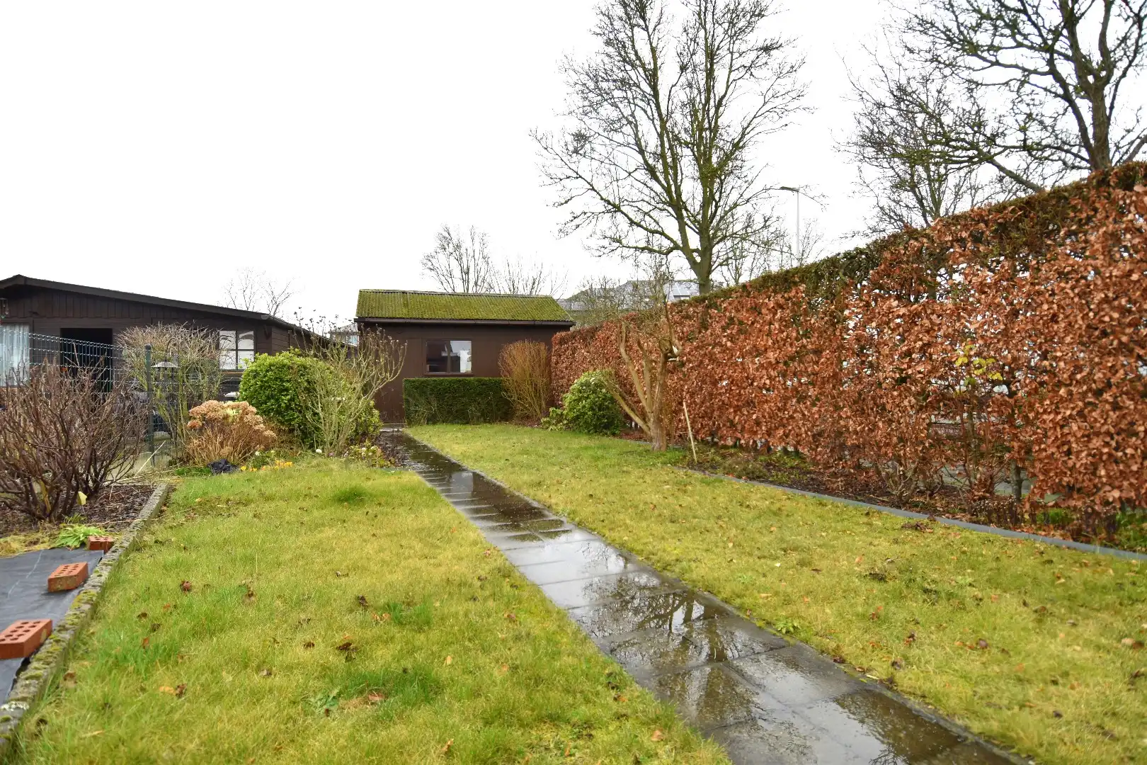 Woning op hoekperceel met 3 slaapkamers, garage en zalige tuin te koop in Gullegem foto 11