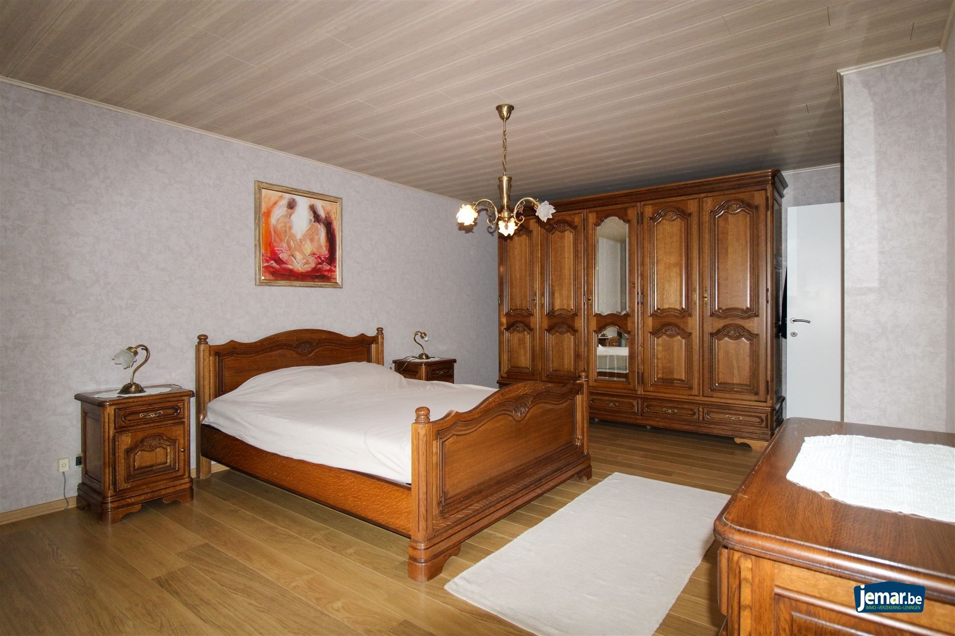 Instapklare en perfect onderhouden woning met 3 slaapkamers, 2 badkamers en een prachtige tuin van 6a74ca  in hartje Maasmechelen! foto 9