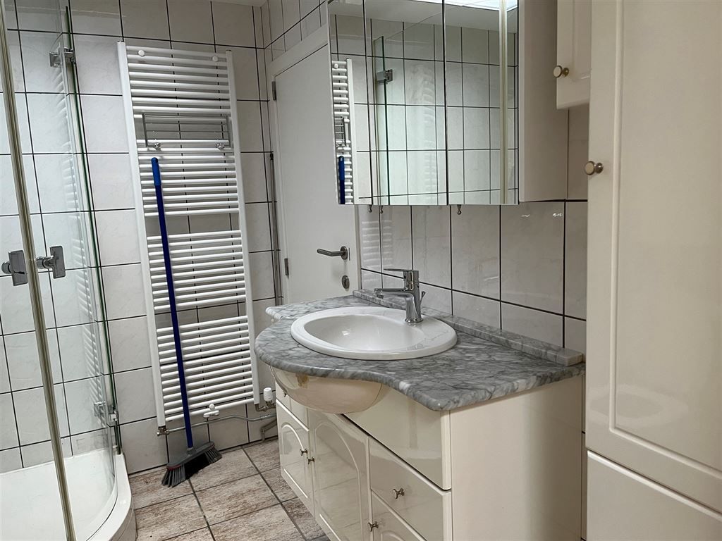 Gezellig en instapklaar triplex appartement met 2 slaapkamers in het centrum van Opoeteren foto 8
