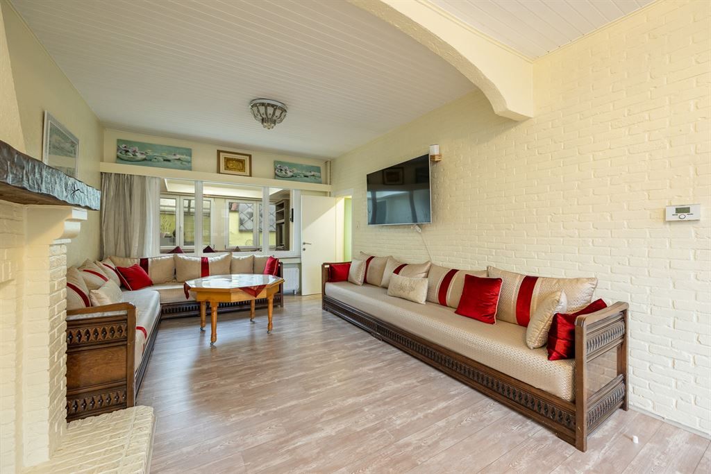 Gezellige woning met ruime garage en stadskoer foto 3