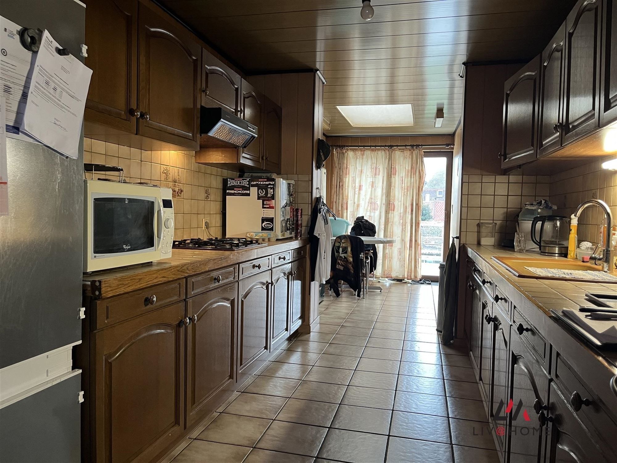 2 aangrenzende rijwoningen met gemeenschappelijke tuin foto 22