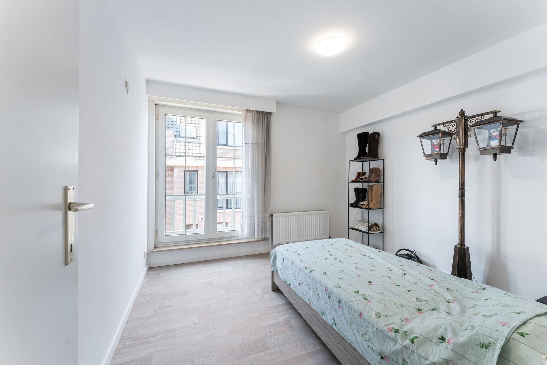 Ruim drieslaapkamerappartement in volle centrum foto 13
