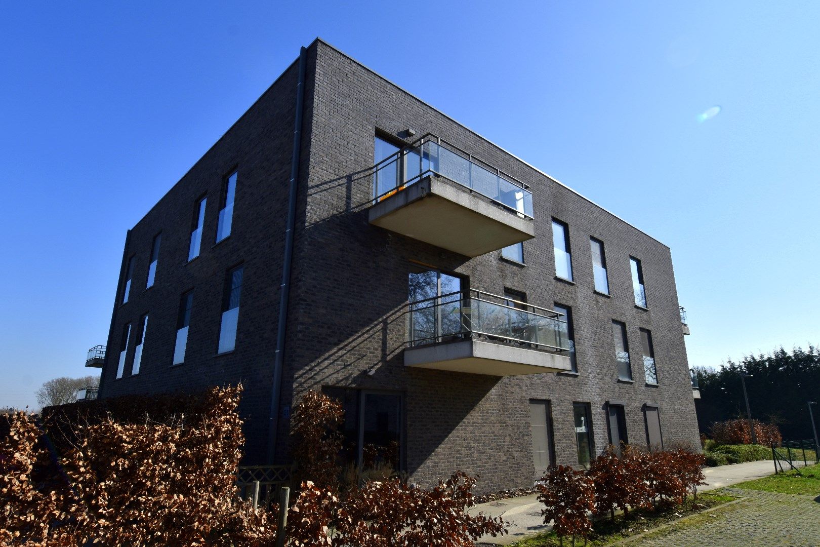 Recent 1-slaapkamerappartement (BJ 2017) met autostaanplaats te koop in een groene omgeving te Heule foto 11