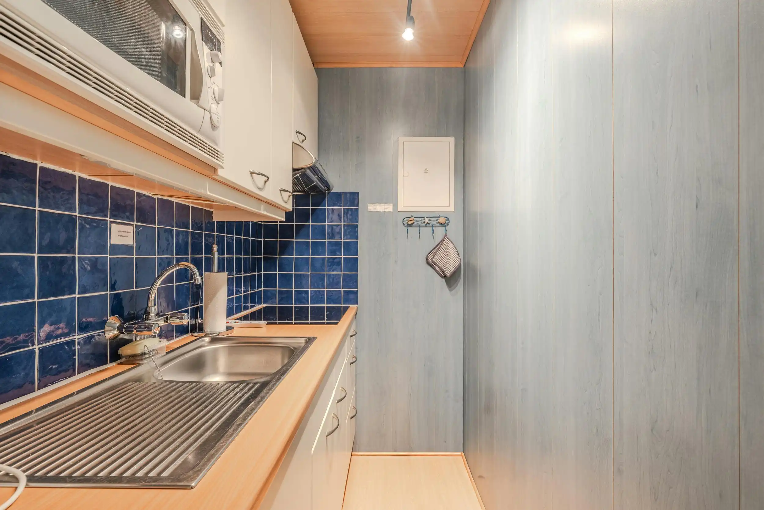 Studio met aparte slaapruimte en zijdelings zeezicht! foto 12