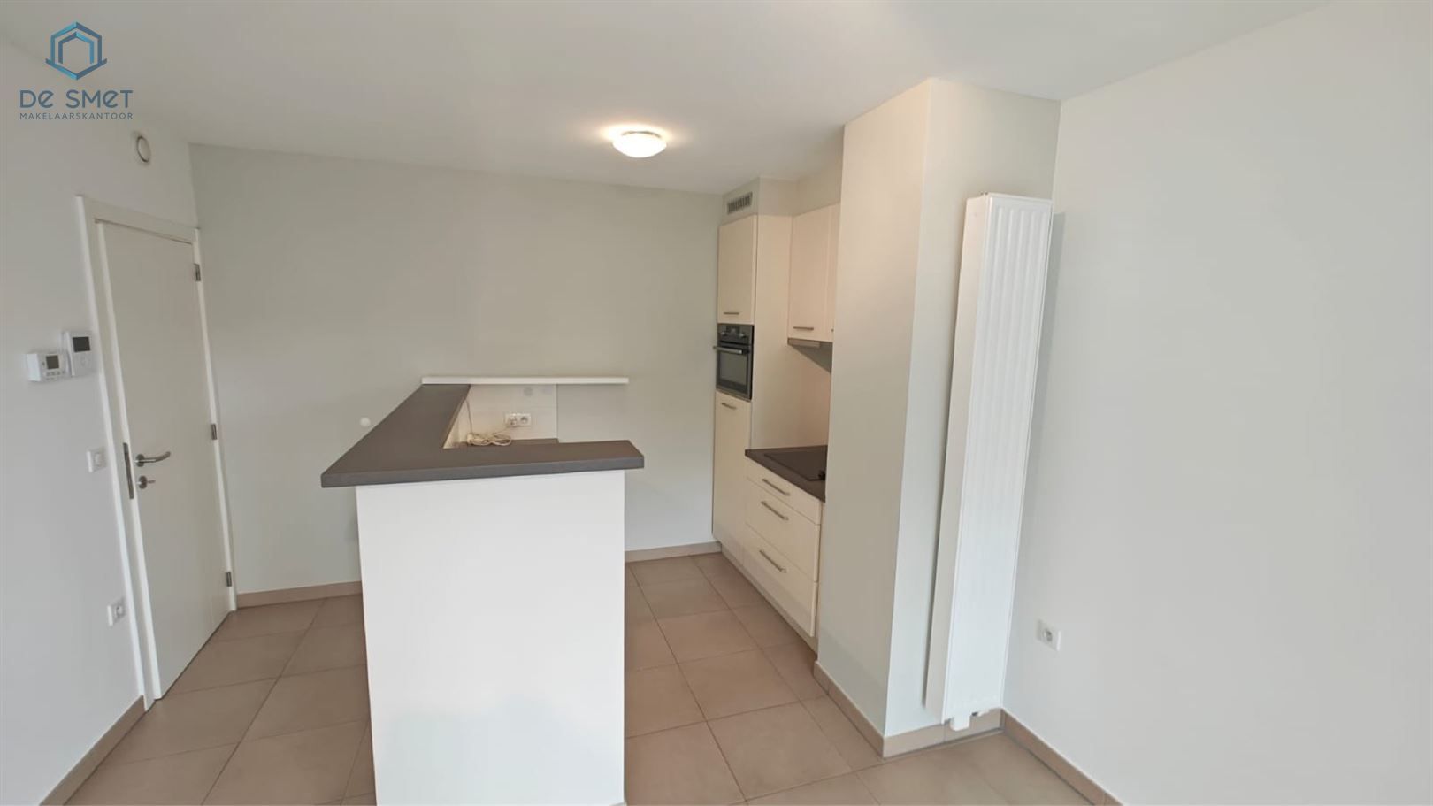 Nieuw te koop in Halle Instapklaar 1-slaapkamerappartement met ruime garagebox! foto 5