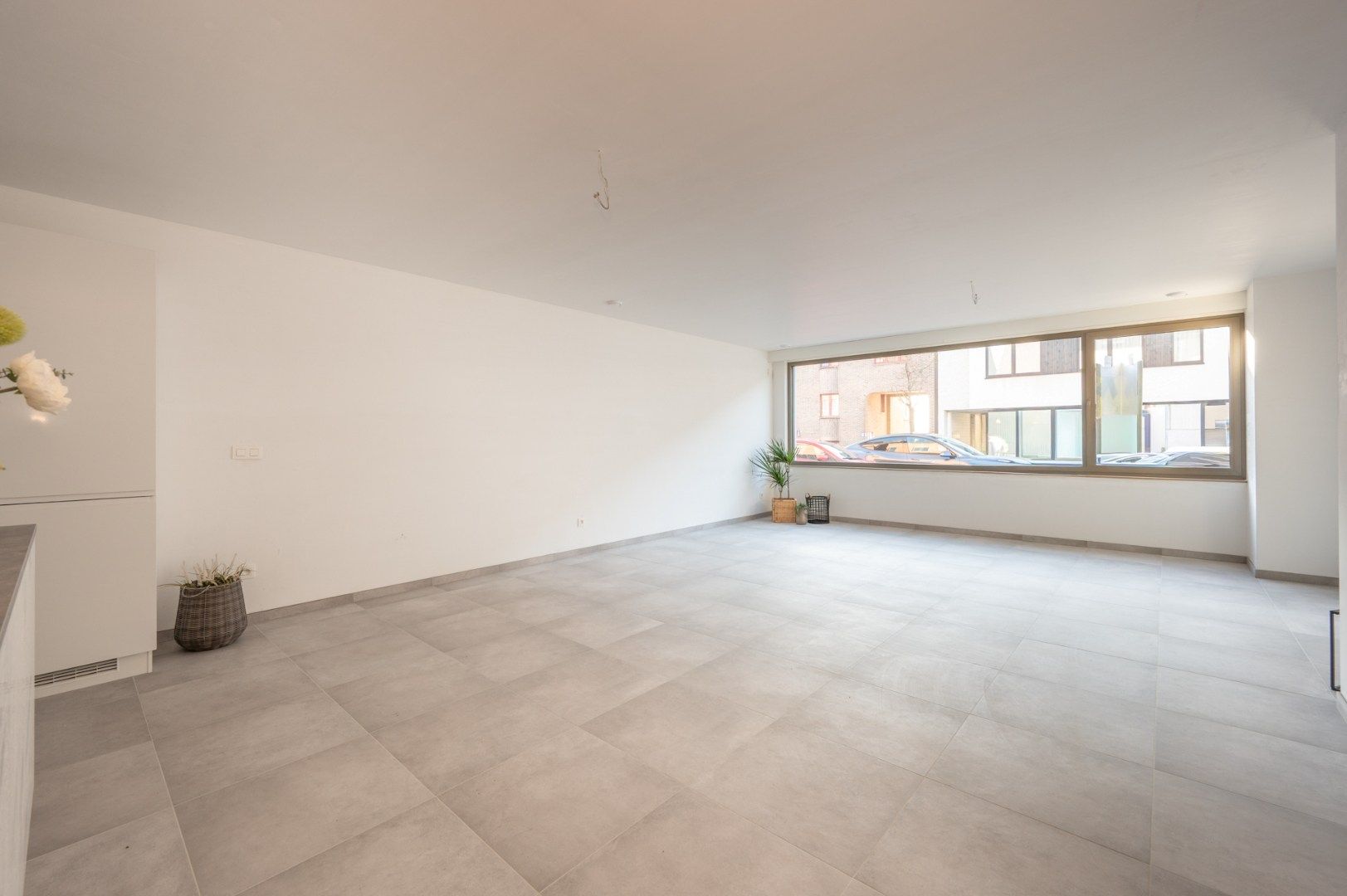 Gelijkvloers appartement met  terras en tuin in hartje Sijsele! foto 4