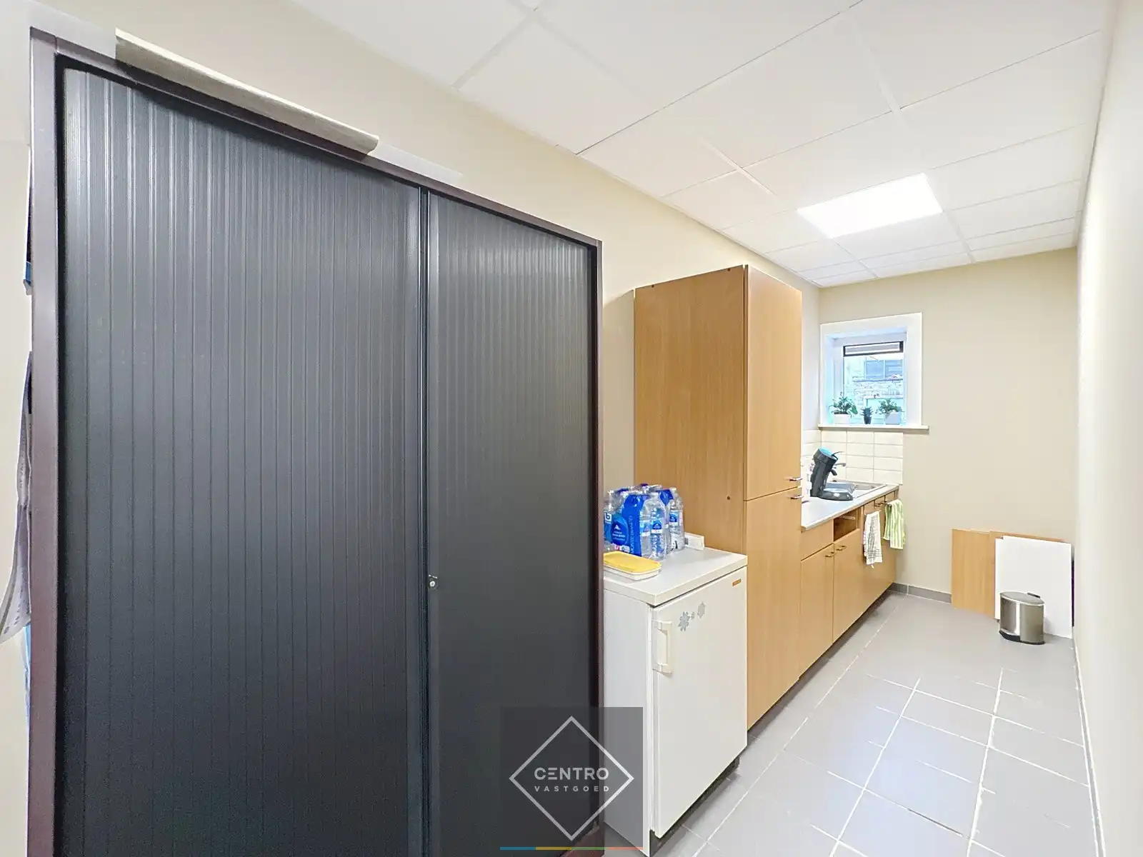 VERHUURD handelsgelijkvloers met 5,5% rendement! foto 12