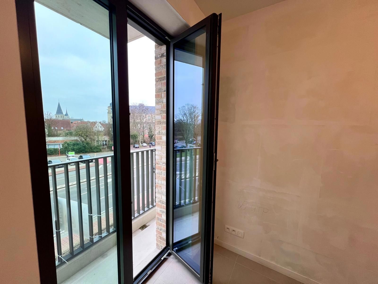 Licht, ruimte en comfort: nieuwbouwappartement met uniek zicht foto 15