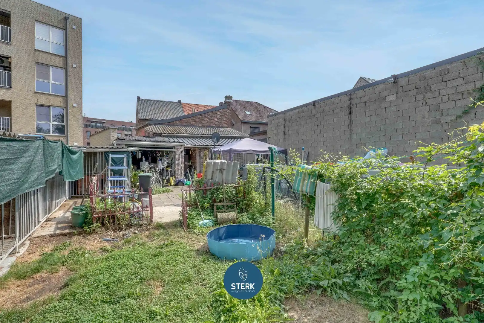 TE RENOVEREN WONING IN HET CENTRUM VAN MAASMECHELEN !  foto 3
