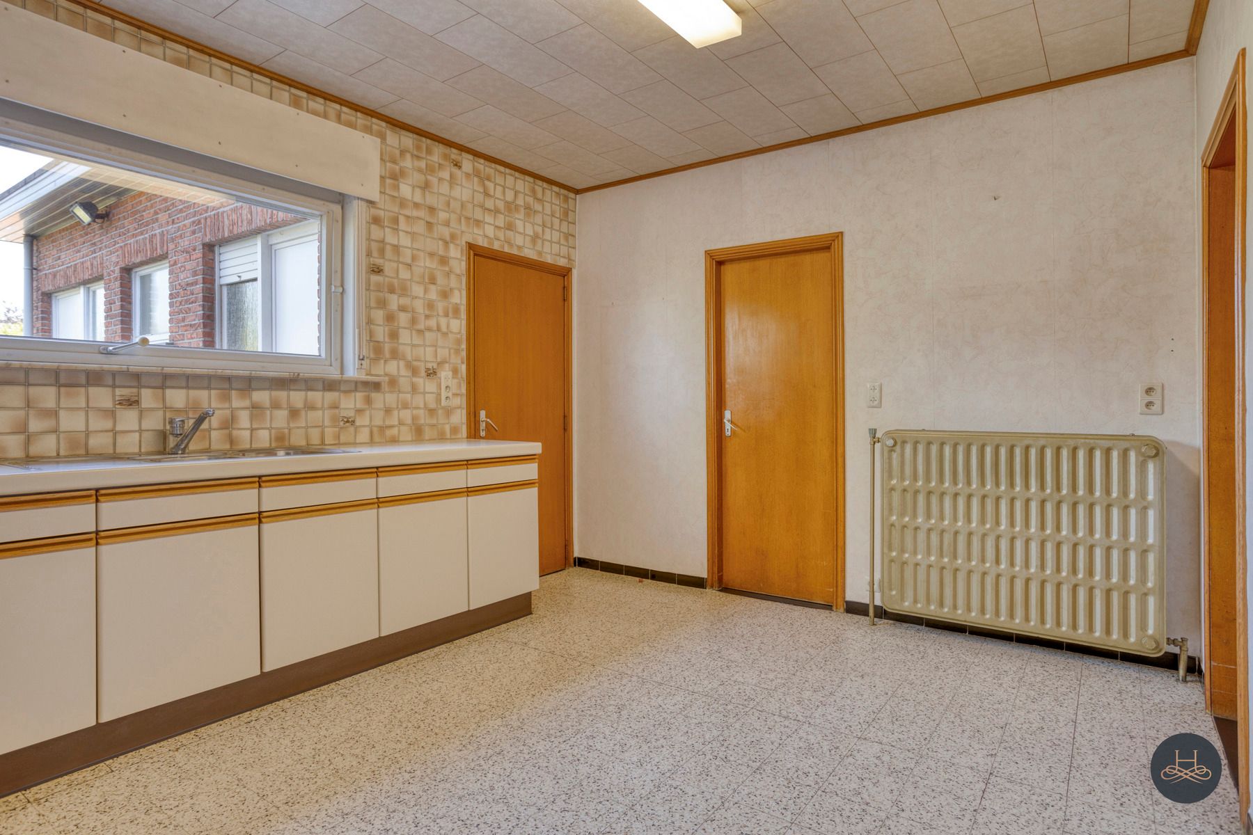 Charmant ruime renovatiewoning gelegen op een enorm perceel foto 12