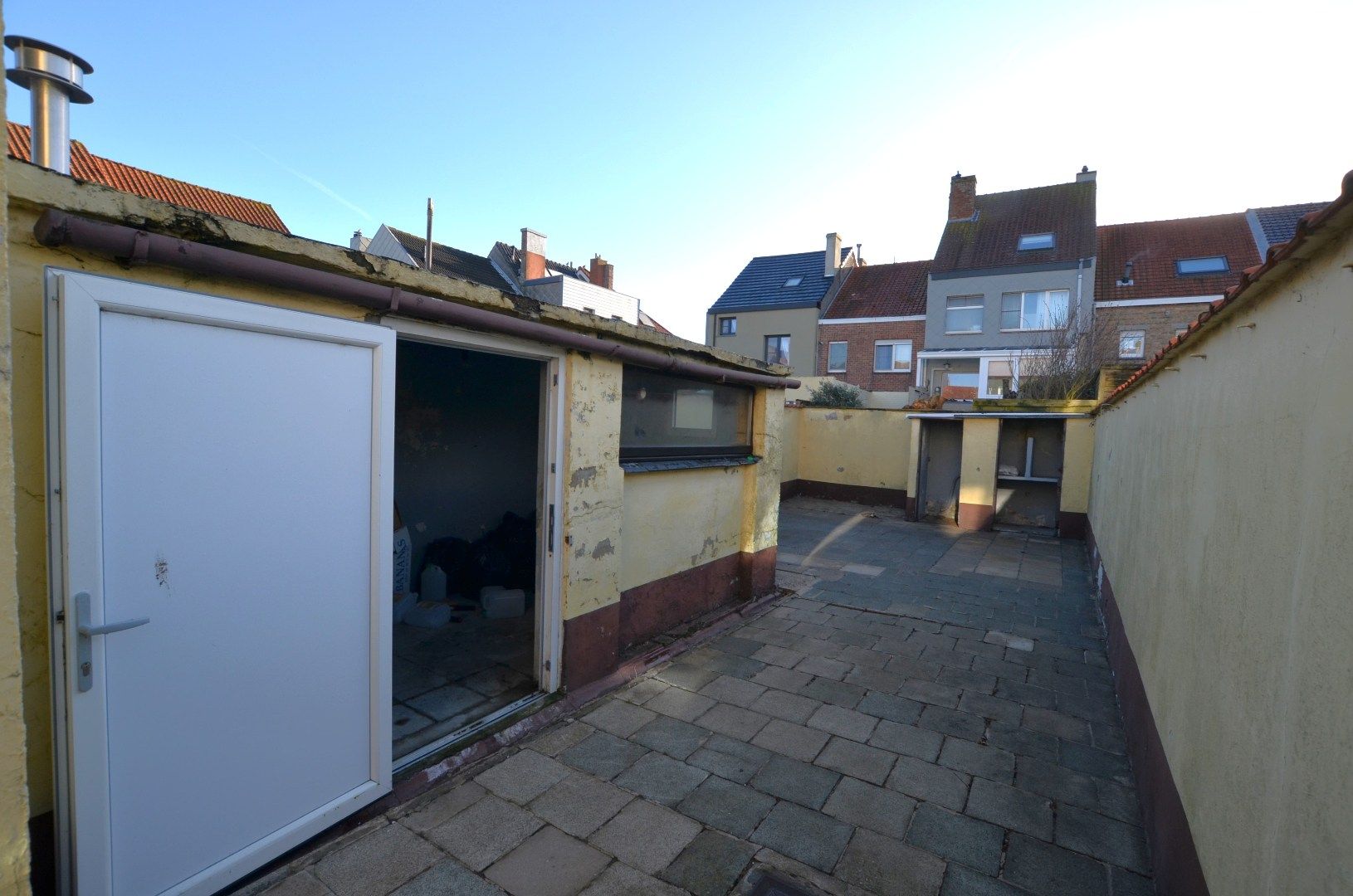 Gedeeltelijk gerenoveerd woonhuis foto 10