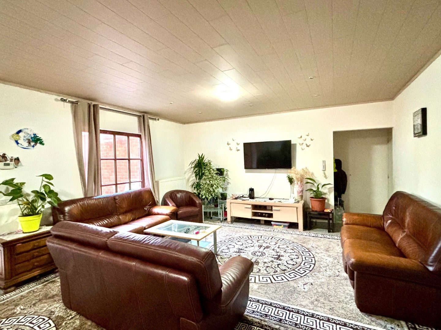 APPARTEMENT MET 2 RUIME SLPKS, GUNSTIG EPC EN RUIME TUIN MET TERRAS foto 4