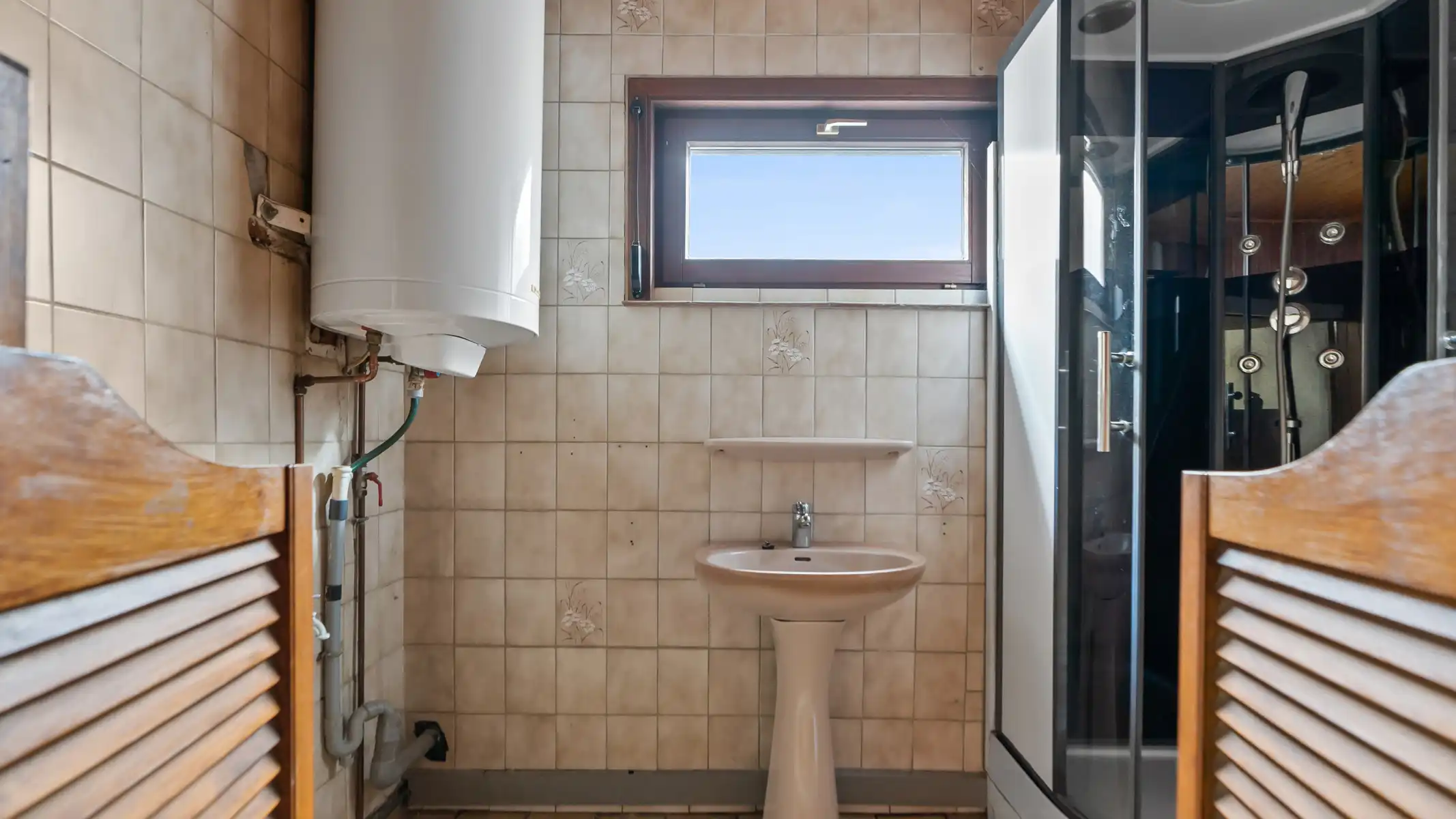 Knusse stadswoning met potentieel in het hart van Herenthout foto 13