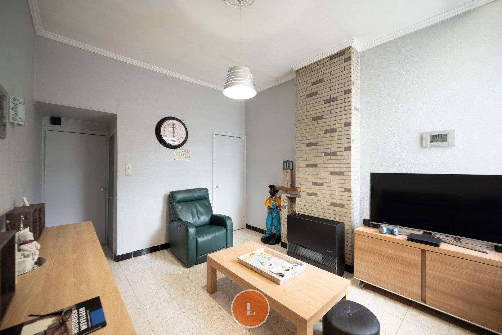 Te renoveren woning te koop in centrum Menen foto 4