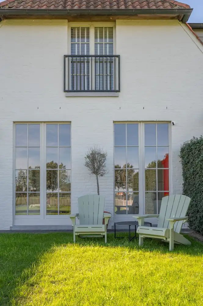 Rustig gelegen koppelvilla met prachtige tuin en open zicht over de weilanden foto 13