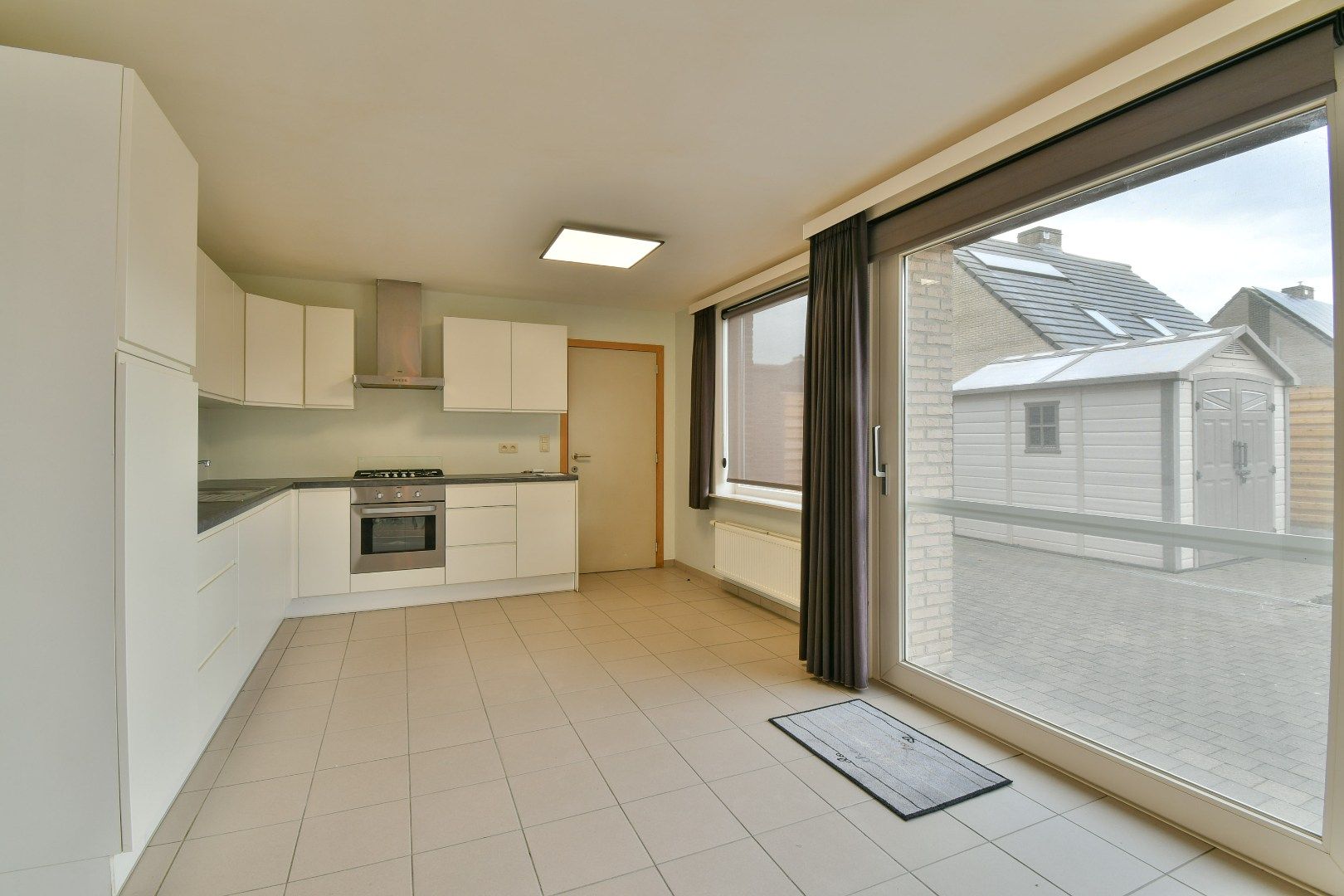 Halfopen gezinswoning met drie slaapkamers foto 6