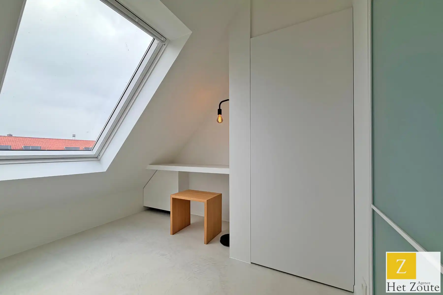 Moderne triplex met zonneterras op de Lippenslaan foto 11