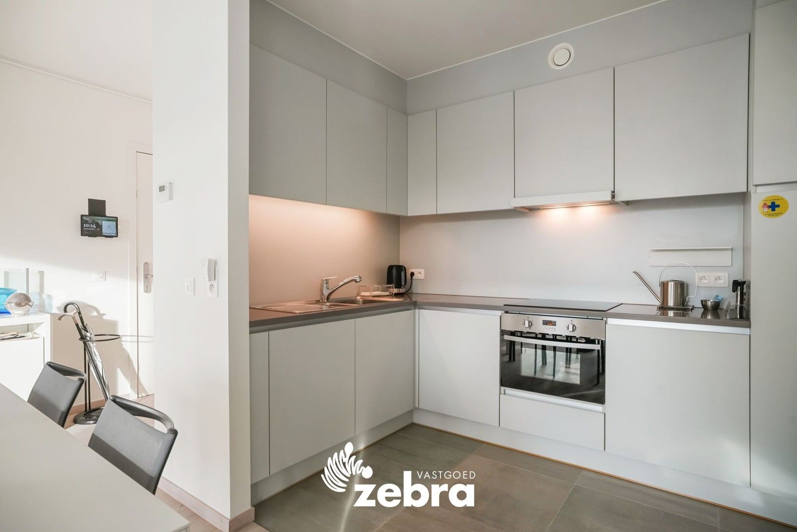 Moderne serviceflat met prachtig zicht op de Leie en autostaanplaats te Deinze! foto 6