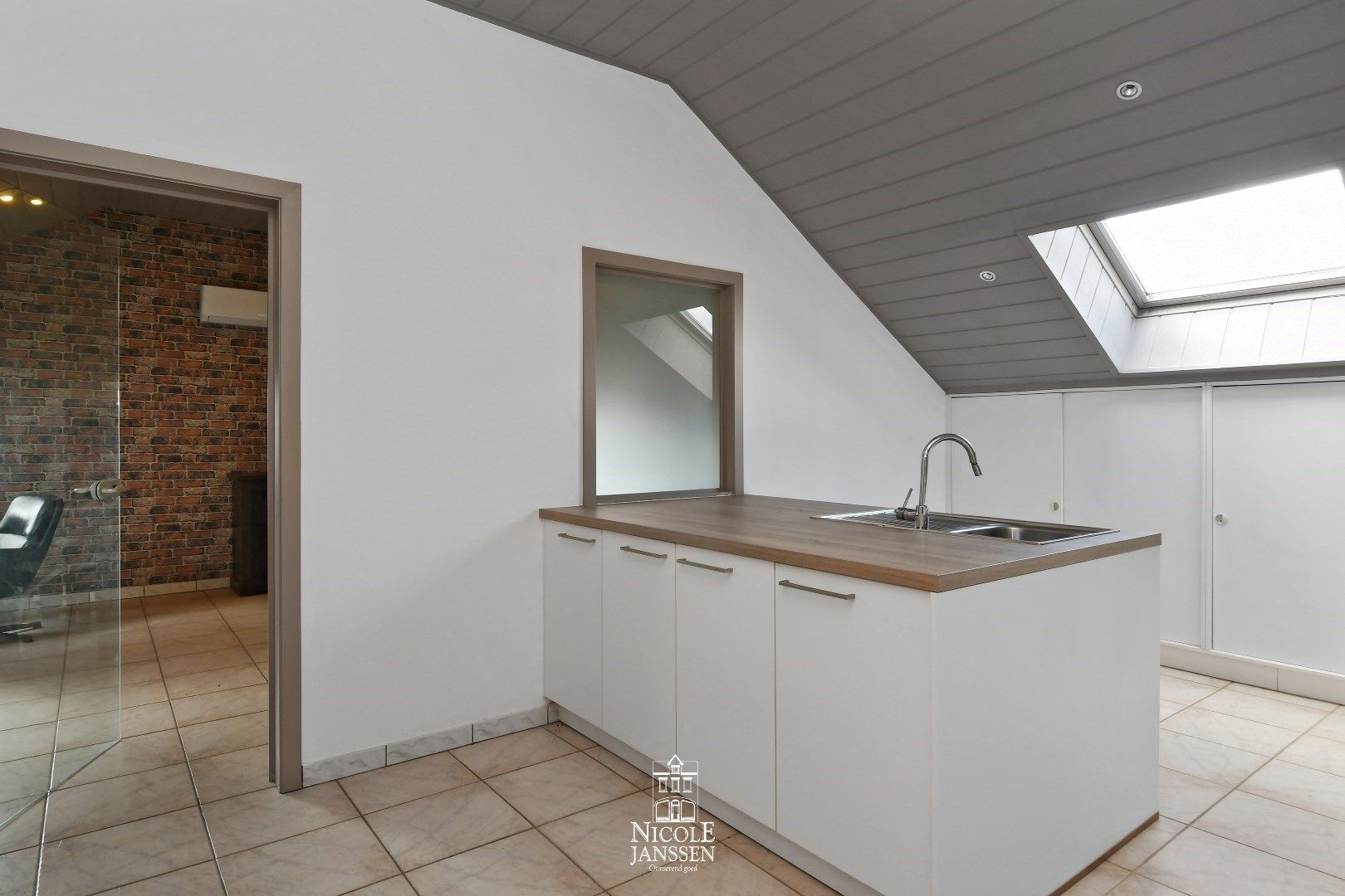 Woonst met studio en handelspand te koop foto 37