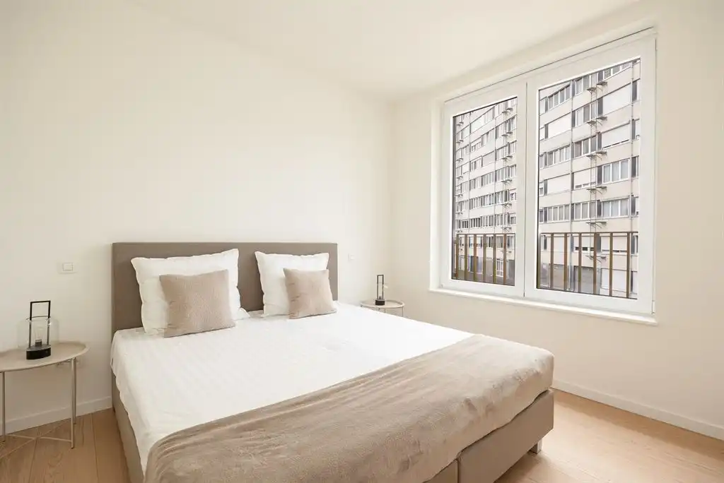 lichtrijk nieuwbouwappartement met terras foto 11