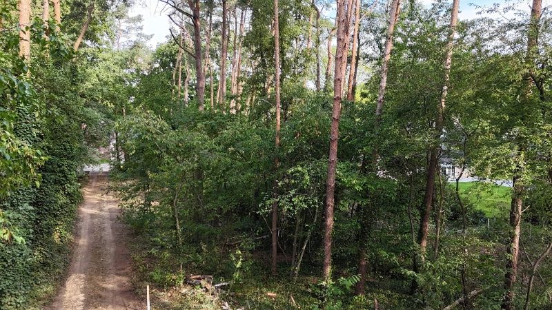 Residentieel gelegen bouwgrond van 15 are voor open bebouwing nabij golf- en meerdomein foto 4