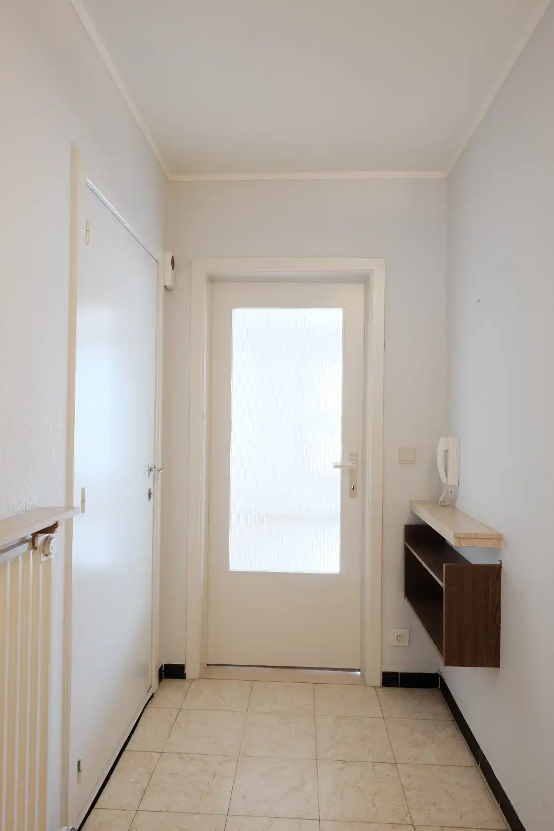 Centraal gelegen gelijkvloers 2-slaapkamerappartement — ideaal als starter of opbrengsteigendom foto 3